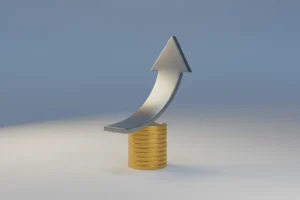 Sleek upward arrow merging into stacked coins on a soft gray-blue background, symbolizing performance-based pay.
